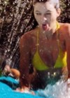 Kendall Jenner - Yellow Bikini Candids In Pool on Slip 'n Slide